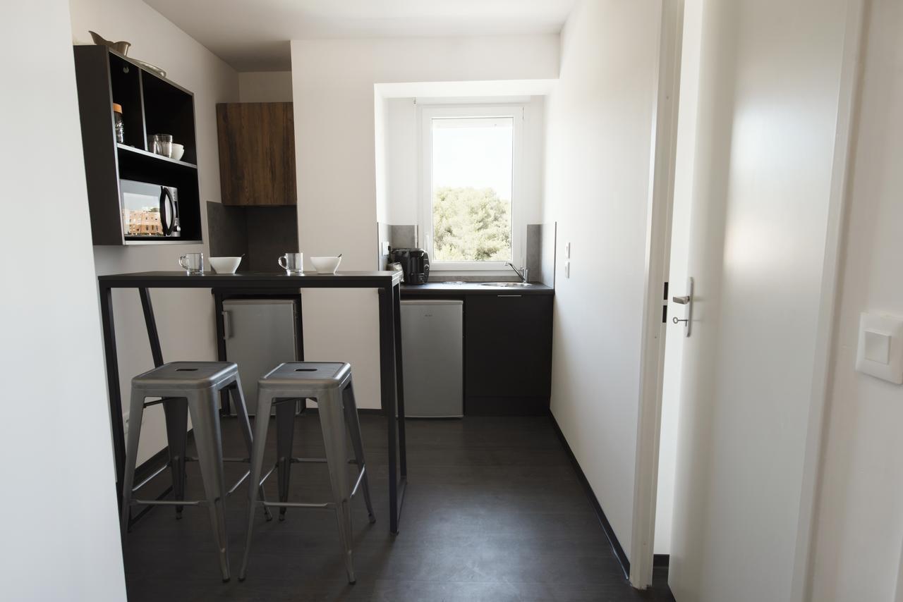 نيم Residence Uxco Kampus 30 Ex Suiteasy المظهر الخارجي الصورة